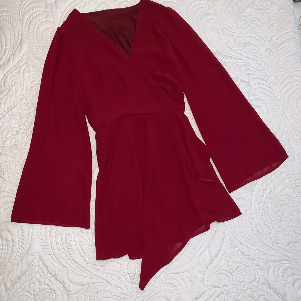 Red romper in red shorts with elastic waist